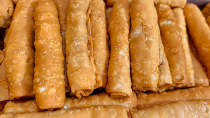 Fried flour rolls Indonesian food complement Indonesian meatballs golden color offers a crunchy and delicious snack experience with a charming texture.