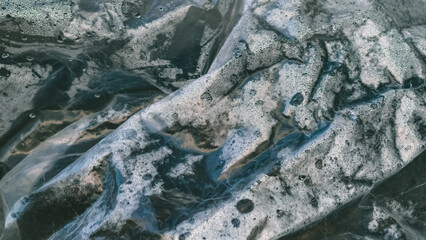 The intricate plastic texture and dew form an interesting abstract artwork