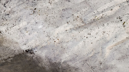 Subtle speckled texture with blended white and gray hues for artistic backgrounds