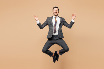 Full body young employee business man corporate wear grey suit shirt tie work in office jump high...