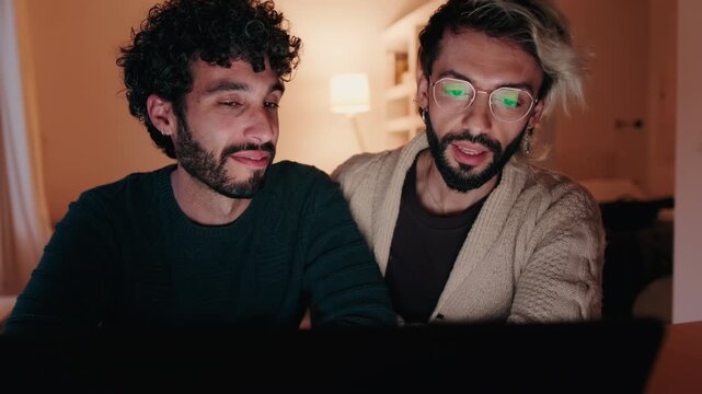 Gay Couple at Home with Laptop