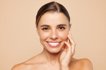 Close up beautiful half naked topless young woman 20s with nude make up looking camera with toothy...