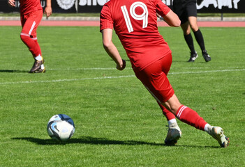 Soccer players in action at the match