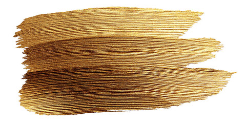 Gold paint stroke on textured background creating an abstract artistic effect