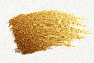 Gold abstract brushstroke texture on a white background highlights modern artistic expression