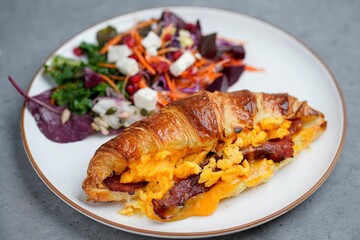 Savory Croissant Sandwich with Scrambled Eggs, Bacon, and Cheese