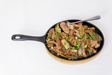 Asian food, pork and cabbage stir fried with spicy sauce