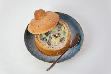 Homemade Broccoli Cheddar Soup in a Bread Bowl Ready to Eat