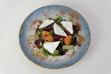 Greek salad on dark background. top view. Healthy food.