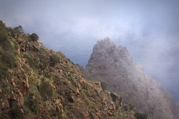 Dramatic Cliffs Rise Above the Ocean Mist on La Gomera in the Canary Islands