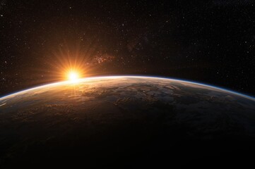 Obraz premium Wide-angle perspective of Earth, the sun, stars, and a galaxy. Dawn seen from space.