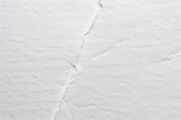 Obraz premium Close-up of soft white tissue paper showing crease details