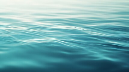 Naklejka premium Gentle blue water surface with soft light reflections.
