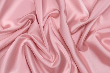 Obraz premium Soft satin fabric with shimmering folds generates a calm and elegant appearance.