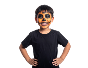 A young boy with artistic skull makeup smiles confidently, showcasing vibrant orange and black paint on his face.