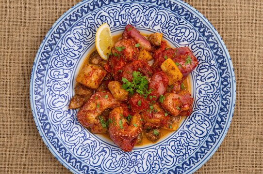 Traditional octopus dish served in Galician style, top view