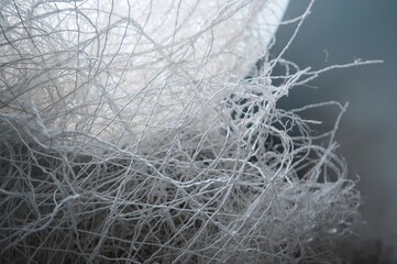 Obraz premium Detailed chaotic plastic construction mesh with blurred sections