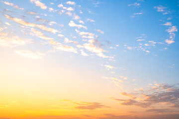 Beautiful , luxury soft gradient orange gold clouds and sunlight on the blue sky perfect for the background, take in evening,Twilight, Large size, high definition landscape photo
