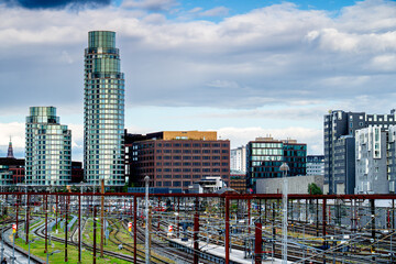 Railway Station in modern district Copenhagen with glass skyscrapers, Denmark.