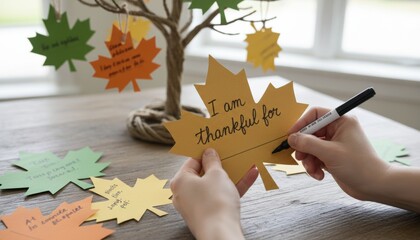 Crafting a thankful tree with handmade paper leaves for gratitude reflection.