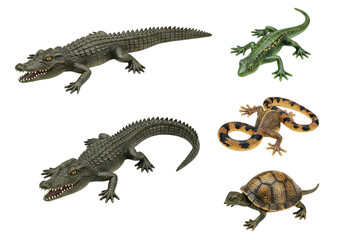 Naklejka premium Collection of toy reptiles including crocodiles, lizard, gecko, and turtle isolated on transparent background