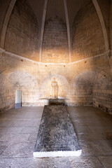 Ancient chapel in Beja, Portugal, with stone monument and crypt