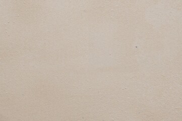 Close-up of soft beige suede material with matte finish