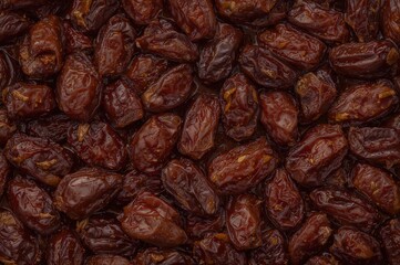 Obraz premium Close-up view of assorted delicious dried dates filling the frame