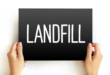 Landfill is a site for the disposal of waste materials, text concept on card