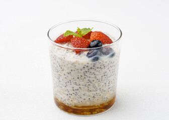 Healthy Chia Seed Pudding with Fresh Berries and Syrup