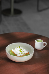 Gourmet Pistachio Milk Cake with Cream and Pistachio Garnish