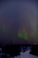 Aurora borealis, polar lights with Milky Way stars.