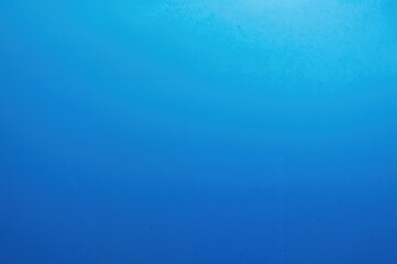 Bright blue backdrop with space for writing