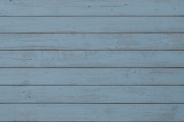 Obraz premium Wooden plank wall showing remnants of paint