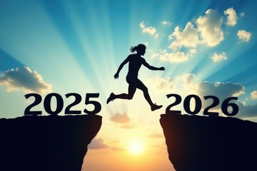 Silhouette of a runner leaping between cliffs marked 2025 and 2026, symbolizing transition and new beginnings against a vibrant sunset backdrop