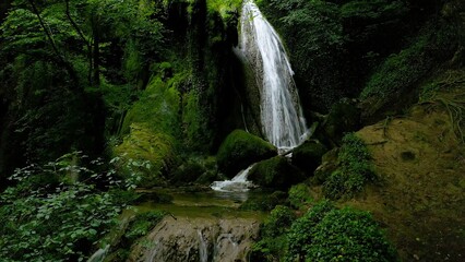 Enchanted Altube town waterfall in the middle of a deep forest in the province of Alava, Spain.