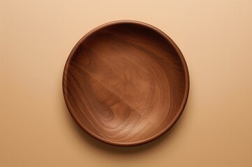 Isolated wooden plate on plain surface, top view