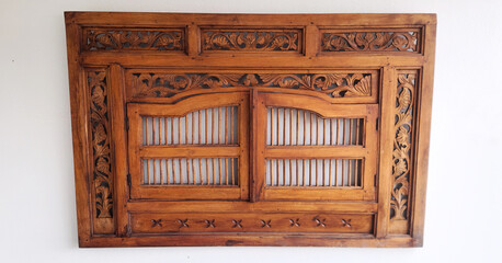 old wooden window with Bali shutters