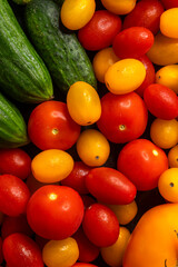 Fresh vibrant heirloom tomatoes and cucumbers creating healthy food