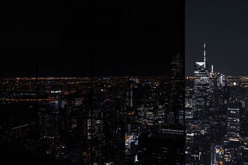 Reflections of skyscrapers on dark glass at night