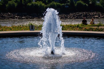 The spray of water from a fountain
