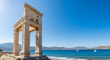 Ancient marble temple ruins stand near the blue Aegean sea under clear sky on Naxos, Greece. Concept for travel destination, historical architecture, and cultural heritage site