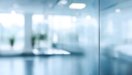 Modern office interior featuring glass walls and a serene atmosphere.