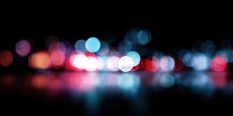 Colorful bokeh lights glowing softly in dark, creating dreamy and abstract atmosphere with red, blue, and purple hues