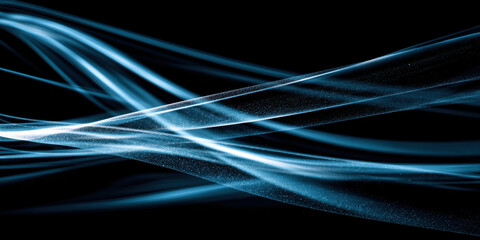 Abstract blue light wave lines flow dynamically on black background creating smooth and futuristic digital effect