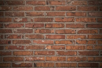 Fototapeta premium Natural background featuring aged brick wall texture