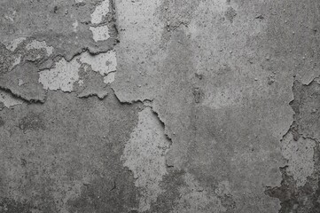 Obraz premium Worn-out tattered shirt fabric with grunge-style tears and holes, perfect for background use