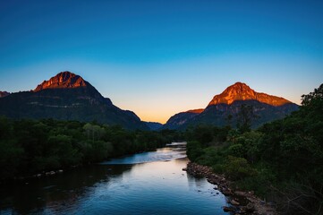 Watercourse flowing through mountainous terrain