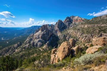 Fototapeta premium Wilderness landscape featuring rugged mountain peaks and natural scenery