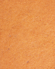 Macro photo of gingerbread as a background. Vertical photo of gingerbread. Food background.